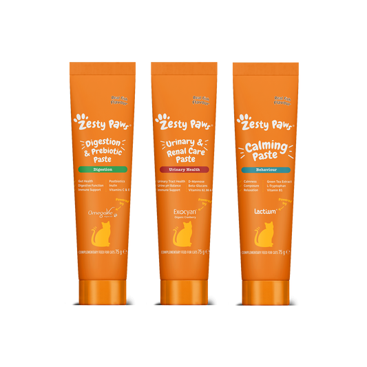 Three tubes of Zesty Paws pet care products on a white background
